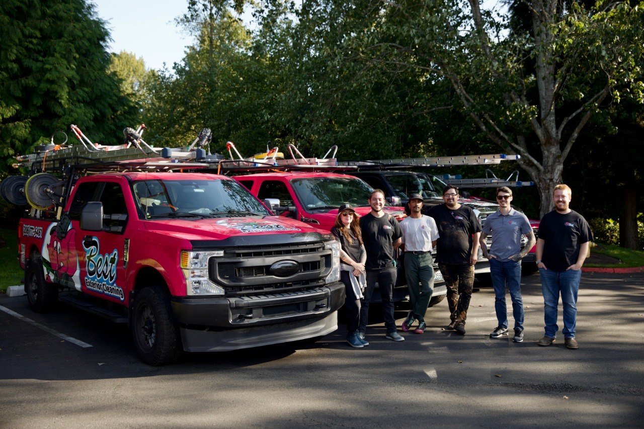 Best Exterior Cleaning crew and branded trucks